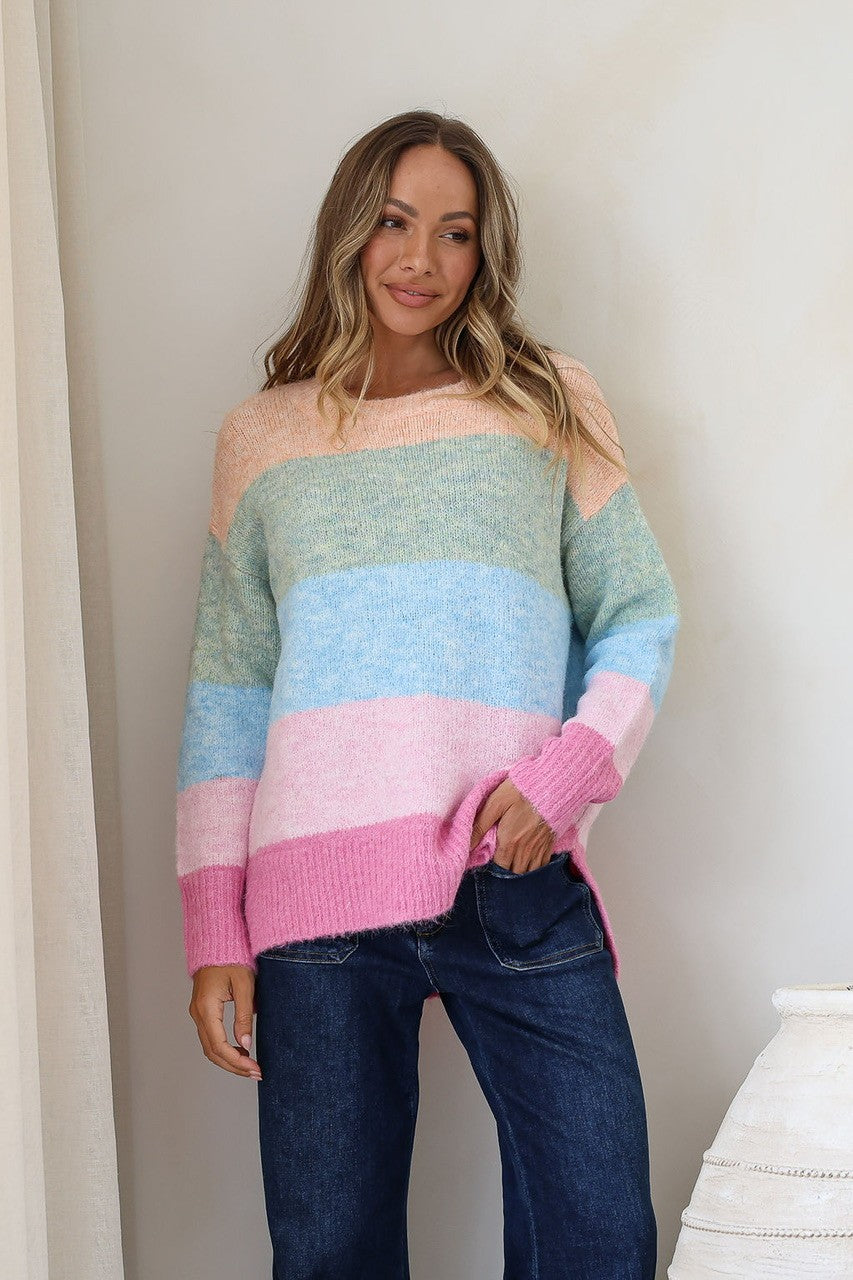 Cali Stripe Knit – model lifestyle shot with dark blue jeans showing front of jumper