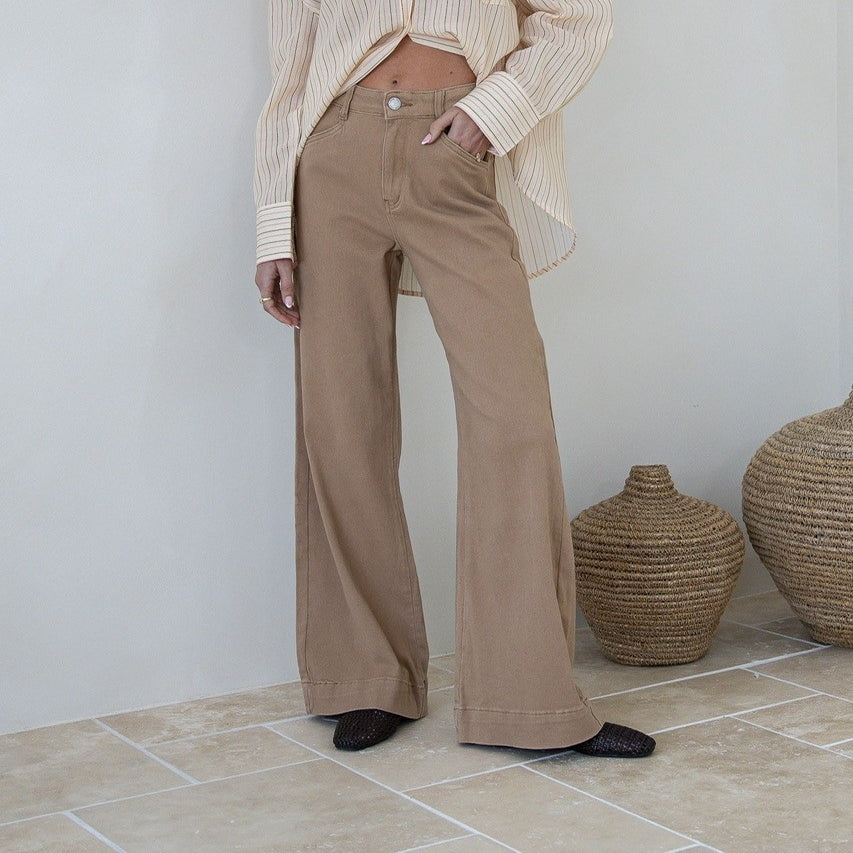 Brownstone Straight Leg Flare Jeans warm beige by Country Denim – model shot of jeans with hand in pocket styled with cotton shirt