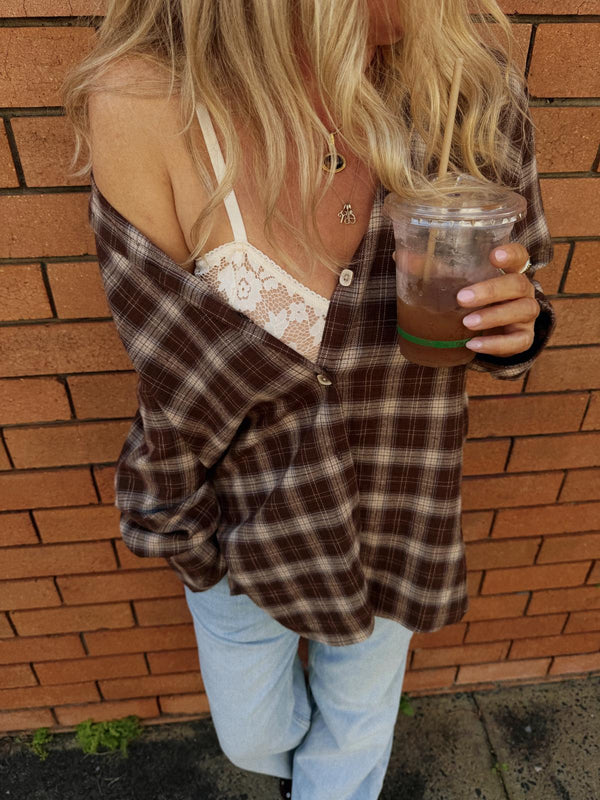Jaase Canyon Austin Flannel Shirt chocolate by Jaase – close-up outdoor model shot with lace crop top underneath and light blue jeans