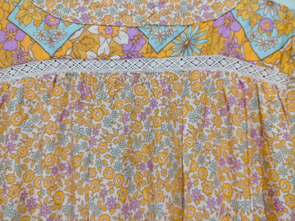 Jaase Jean Maxi Dress Forget Me Not print – close-up of exclusive pink floral print fabric
