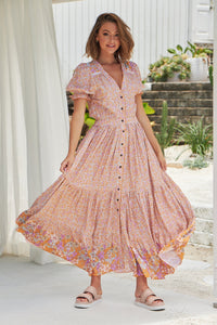 Jaase Jean Maxi Dress Forget Me Not print – model twirling showing flowy skirt movement