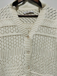 Cloud Dancer Crochet Cardigan natural cream – flat lay close-up of front showing pointelle crochet detail