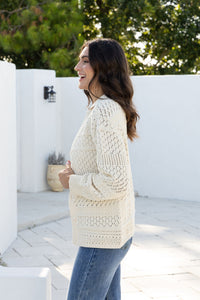 Cloud Dancer Crochet Cardigan natural cream – model side view