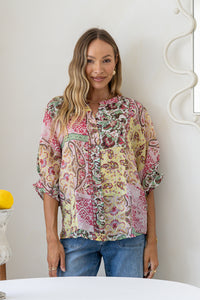 Marbella Blouse Paisley Pink print – model front shot showing button-down detail