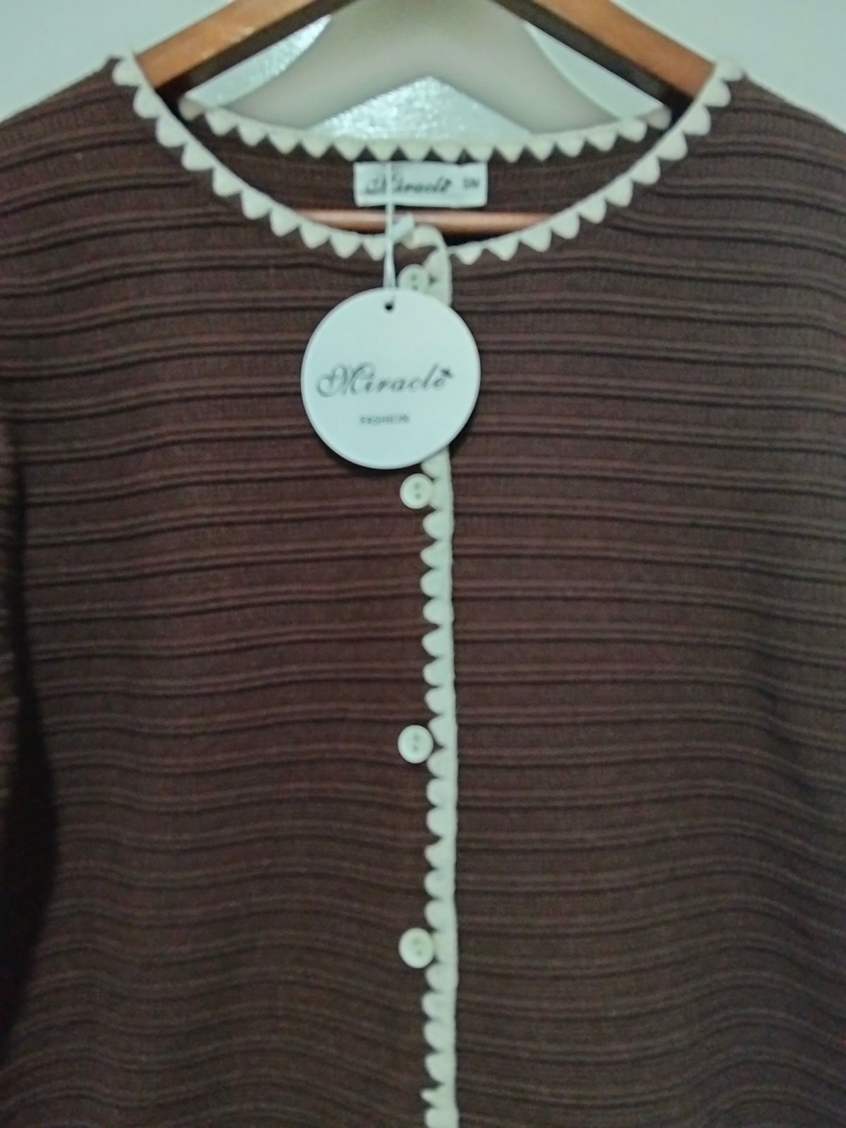 Praline Ribbed Blanket Stitch Cardi chocolate – flat lay close-up of front showing ribbed detail and buttons