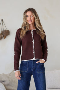 Praline Ribbed Blanket Stitch Cardi chocolate – model hand in pocket shot