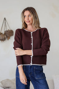 Praline Ribbed Blanket Stitch Cardi chocolate – close-up model shot with arm across body