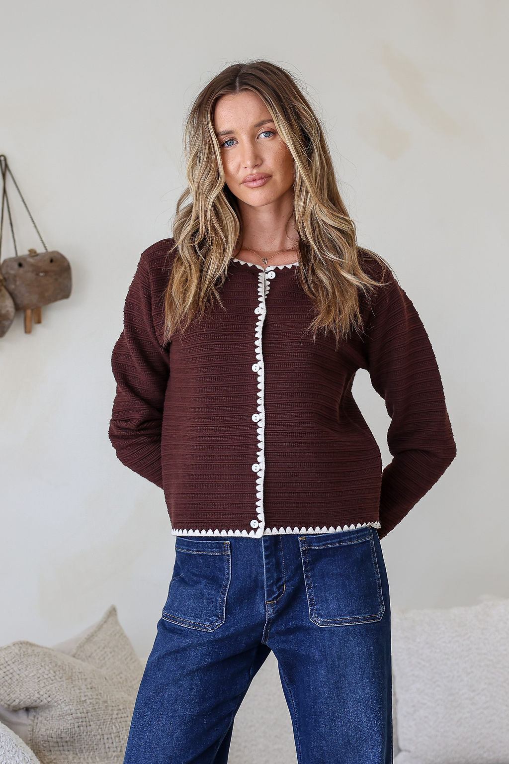 Praline Ribbed Blanket Stitch Cardi chocolate – model with arms behind back
