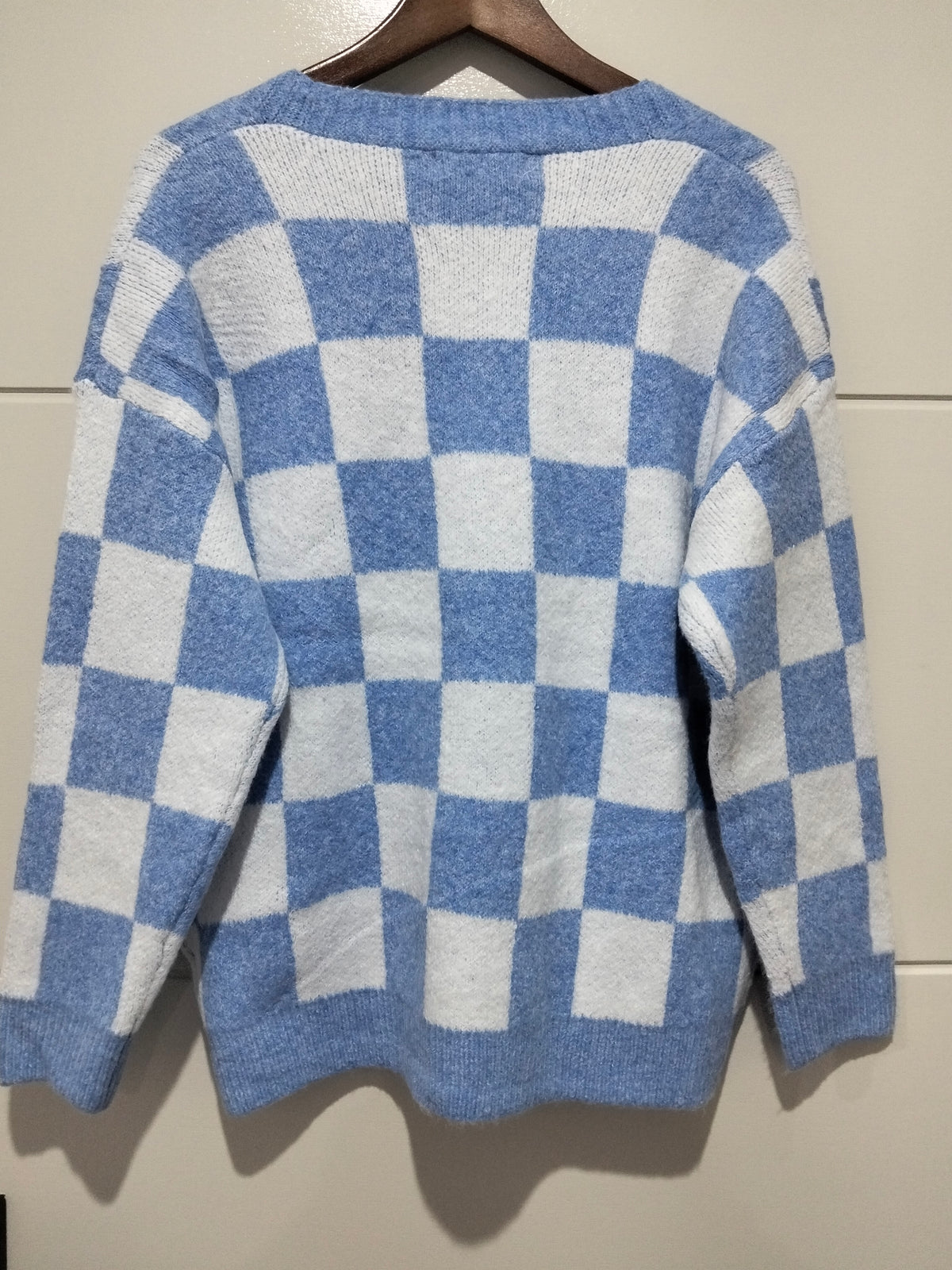 Monti Checker Knit Cardi powder blue and white – flat lay back view