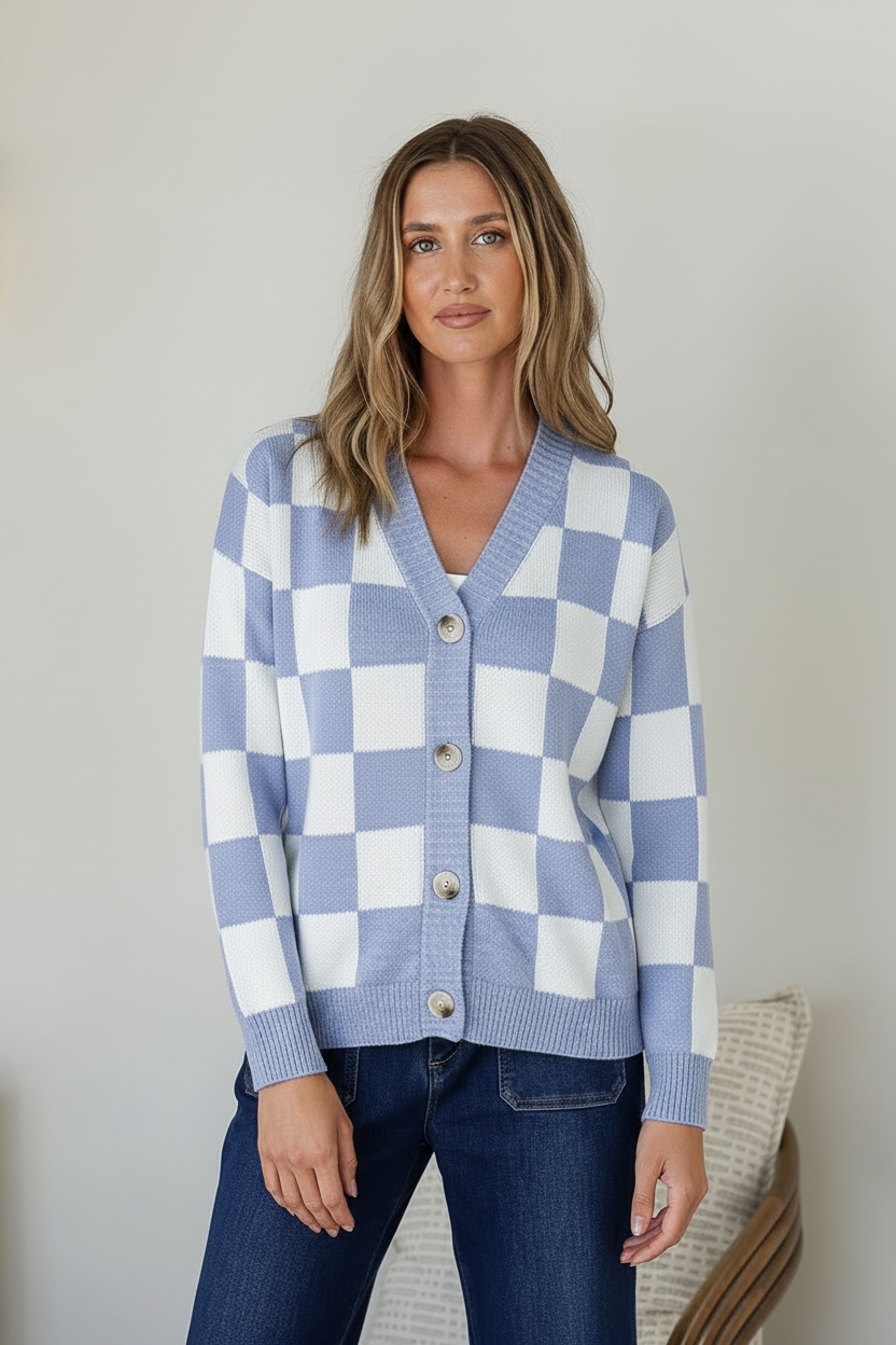 Monti Checker Knit Cardi powder blue and white – model front shot buttoned up with dark blue jeans