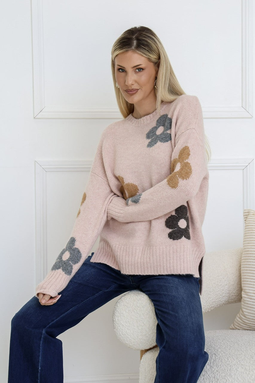 Sacha Daisy Knit Jumper blush – model sitting front view showing ribbed cuff sleeve detail