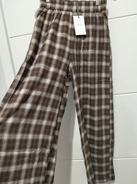 Jaase Stevie Austin Flannel Pants chocolate by Jaase – flatlay shot showing wide of wide leg of pant front view