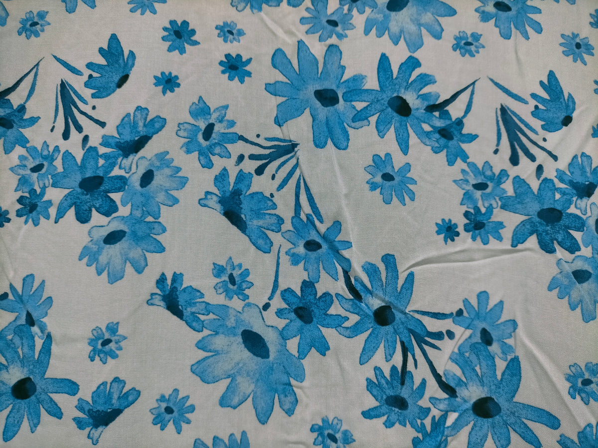 Jaase Monday Midi Dress blue prairie print – flat lay close-up of exclusive blue prairie print fabric