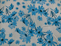 Jaase Monday Midi Dress blue prairie print – flat lay close-up of exclusive blue prairie print fabric