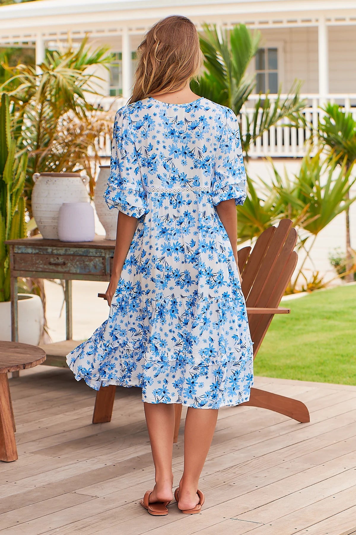 Jaase Monday Midi Dress blue prairie print – model full length back view standing