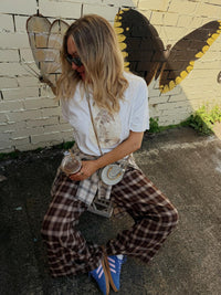 Jaase Stevie Austin Flannel Pants chocolate by Jaase – model sitting outdoor lifestyle shot