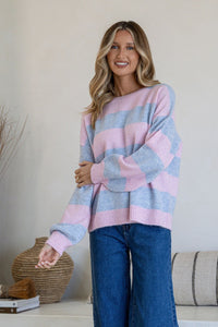 Brady Bunch Stripe Knit blue pink – lifestyle model shot styled with blue denim jeans