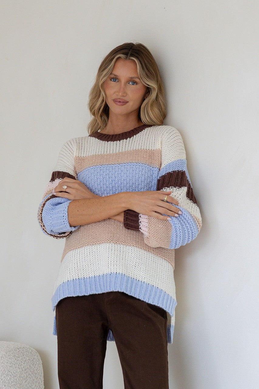 Bastille Chunky Knit Jumper blue stripe – model front view with arms crossed