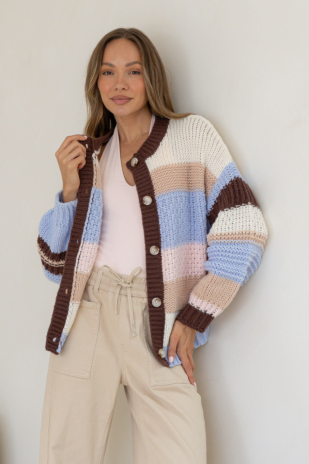 Miss Marlow Bastille Chunky Cardi blue stripe – pose showing button section of knit